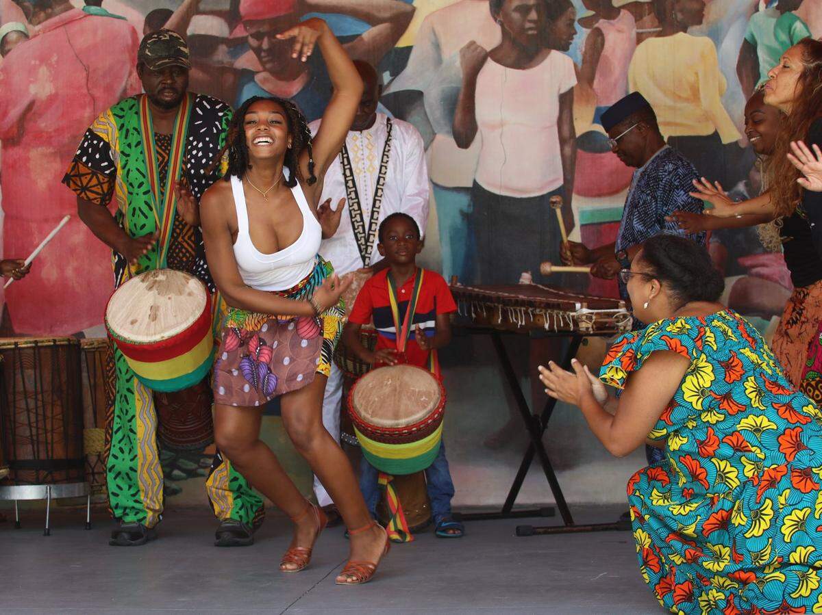 On Sunday, May 16, 2021 Delou Africa Dance Ensemble member Asha Dorsey, left, performs during video taping for Brooklyn Academy of Musics DanceAfrica Festival, a virtual dance festival performance this year celebrates the ancestral energy of Haiti with the theme Vwa zanset yo: yap pale, nap danse!, in Haitian Creole (Ancestral voices: they speak we dance!) on Sunday, May 30, 2021 in Brooklyn, NY.Note:  The program of dance premieres draws inspiration from the lwa, spirits of Haitian Vodou, and brings together a community from near and far. DanceAfrica Artistic Director Baba Abdel R. Salaam commissioned pieces by HaitiDansco in Cap Haitien, Haiti, Rara Tou Lim Haitian Dance Company in Oakland, À?? Dance Theatre Collective in Brooklyn, and The Fritzation Experience in Brooklyn. Including a virtual Libation ceremony and Procession of the Council of Elders that crosses the country, this unprecedented DanceAfrica performance stretches from coast to coast to coast.Source - https://www.bam.org/danceafrica
