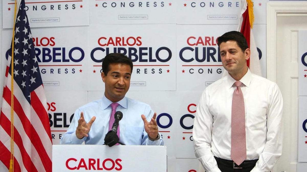 En octubre del 2016, durante su campaña para la Cámara, el republicano Carlos Curbelo recibió el apoyo de Paul Ryan (der.).