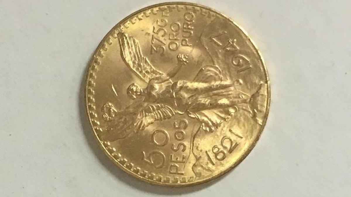 Una moneda mexicana de oro es el regalo del conocido como “Coin Crusader” para la campaña de Red Kettle en Pompano Beach.