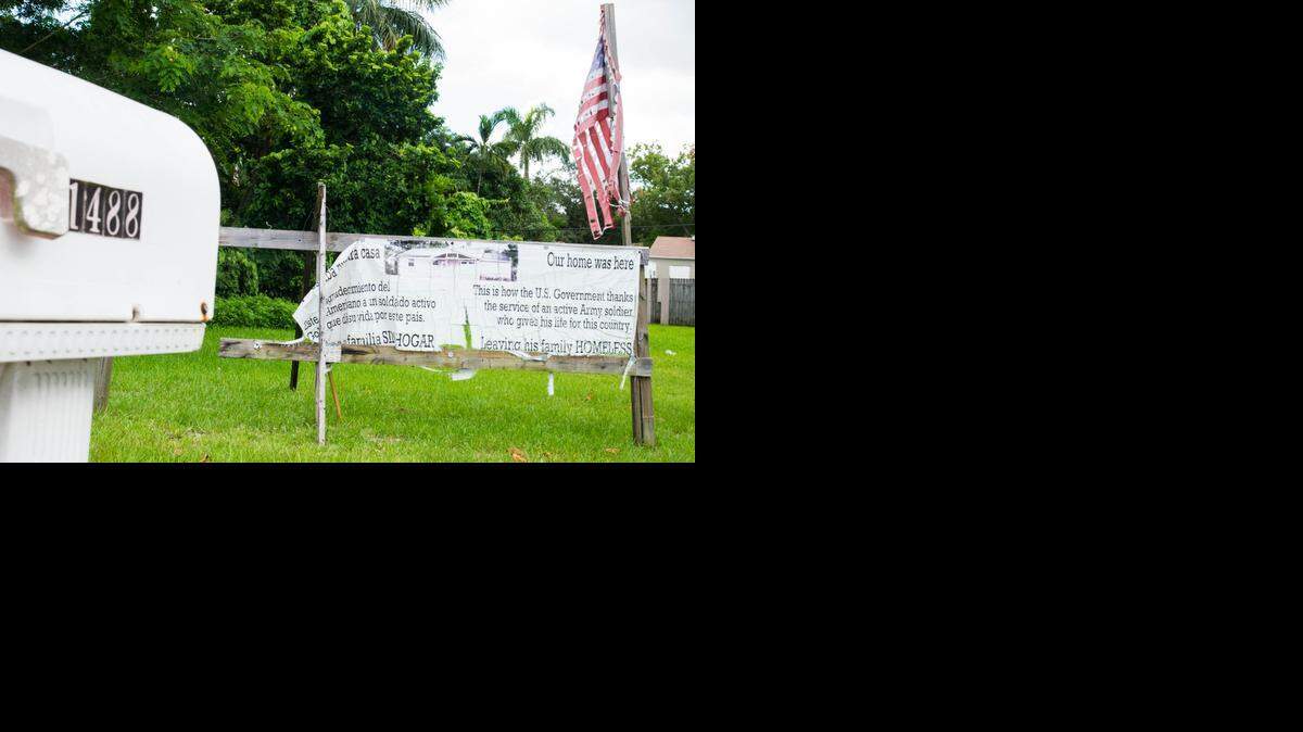 
Un deteriorado cartel en el lote donde estuvo la casa del soldado Jesús Jiménez en 1488 NW 103rd St. en Miami.

