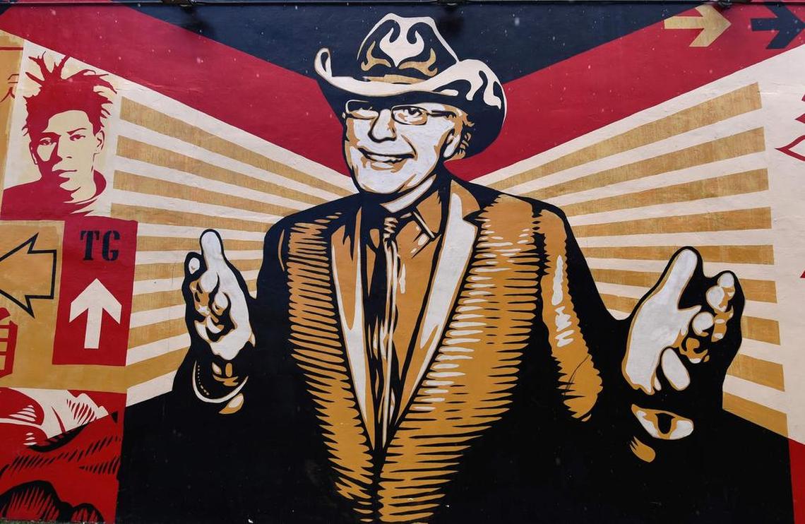 A portrait of Tony Goldman adorns the center of a mural by artist Shepard Fairey in the Wynwood neighborhood of Miami, Florida, on September 28, 2016.