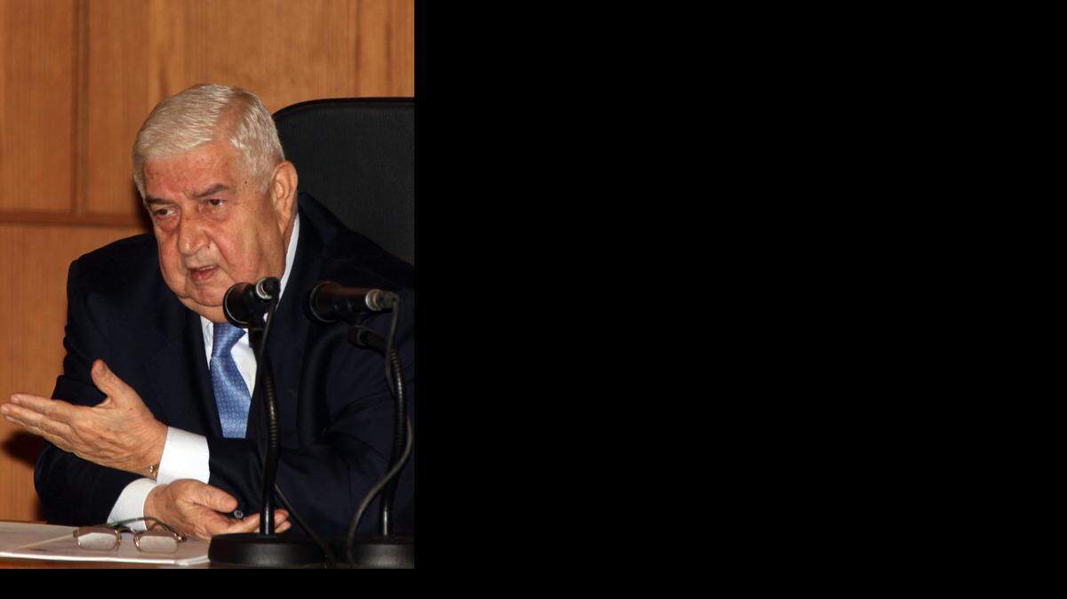 <cutline_leadin>El ministro</cutline_leadin> sirio de Asuntos Exteriores, Walid al Mualem, durante una rueda de prensa<italic></italic>. Foto de archivo