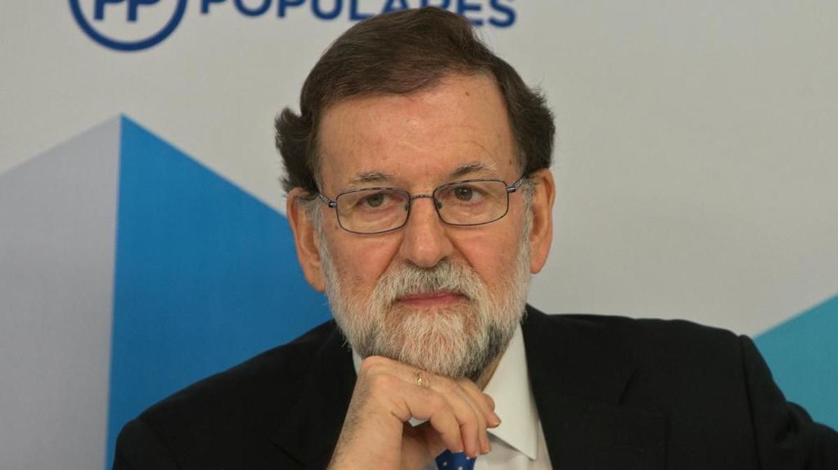 El presidente del gobierno español, Mariano Rajoy, poco antes del inicio de una reunión del comité ejecutivo nacional del Partido Popular el viernes 22 de diciembre en Madrid.