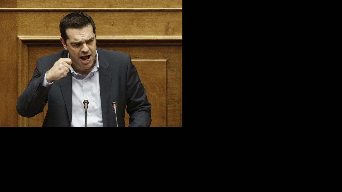 <cutline_leadin>El primer</cutline_leadin> ministro Alexis Tsipras pronuncia un discurso, el martes, en el Parlamento griego en Atenas, Grecia. El Parlamento griego dio su confianza al nuevo Ejecutivo de Alexis Tsipras sobre el programa de Gobierno.