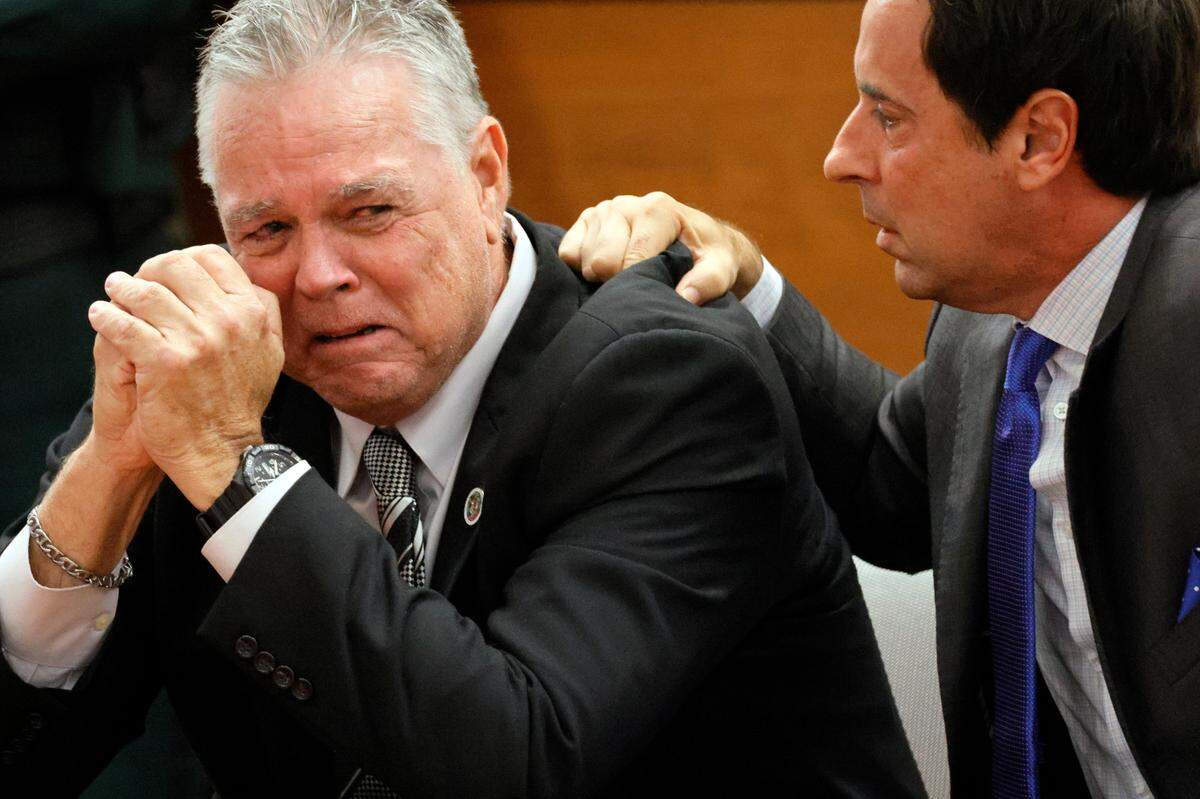 Scot Peterson, former school resource officer for Marjory Stoneman Douglas High School, reacts after he is found not guilty on all charges at the Broward County courthouse in Fort Lauderdale.