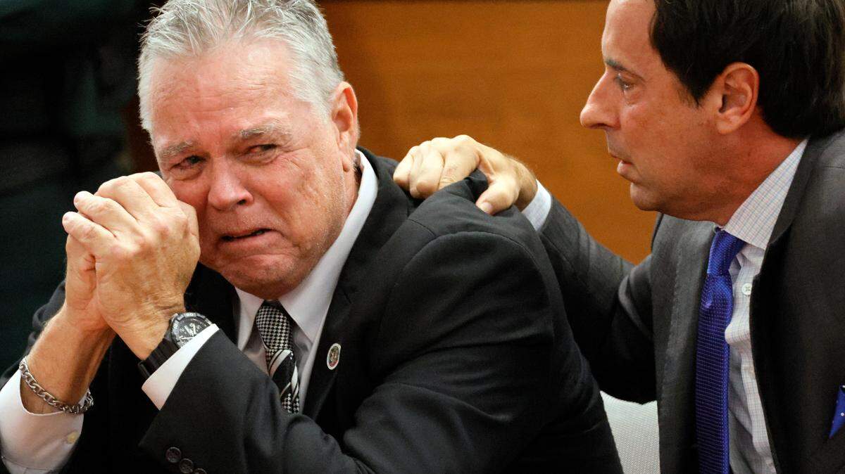 Scot Peterson, former school resource officer for Marjory Stoneman Douglas High School, reacts after he is found not guilty on all charges at the Broward County courthouse in Fort Lauderdale.