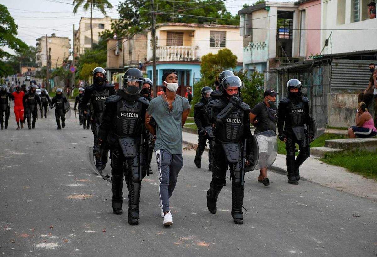 Police arrest a protester in Havana, Cuba during the wave of protests that took over Cuba in summer of 2021.