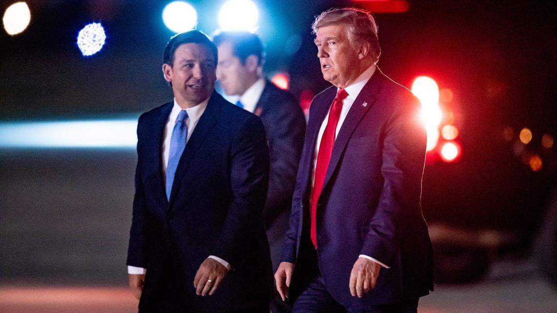 File art: Florida Gov. Ron DeSantis greets then-president Donald Trump at Palm Beach International Airport in West Palm Beach.