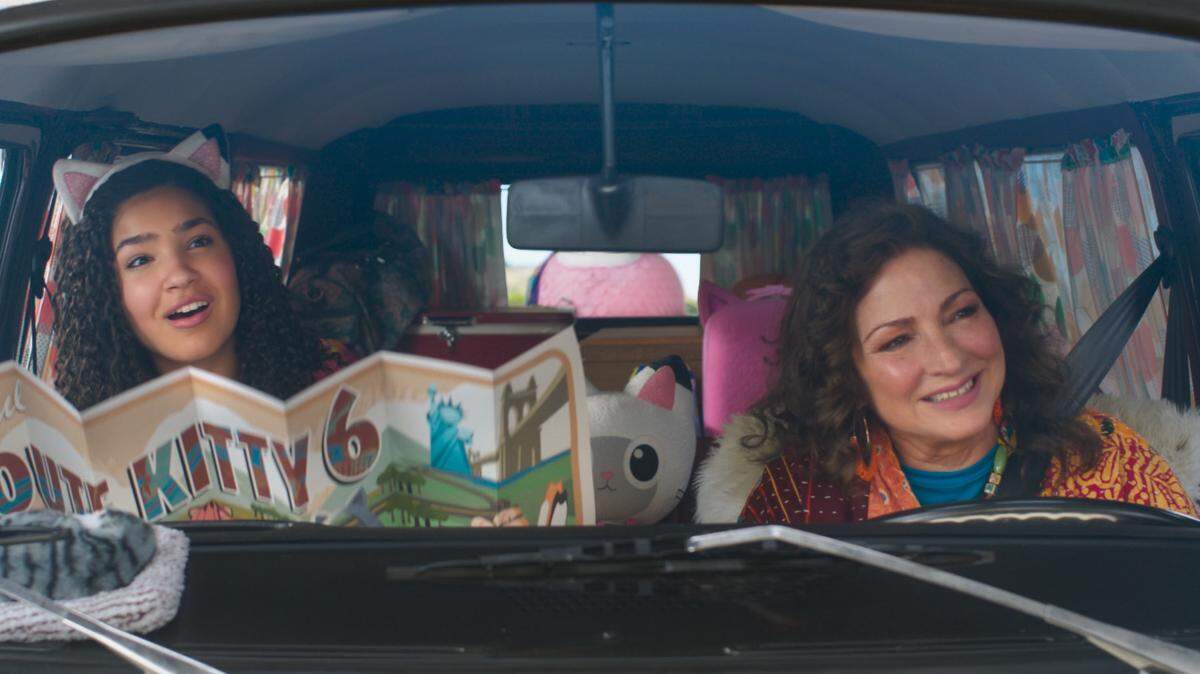 (from left) Gabby (Laila Lockhart Kraner) and Gigi (Gloria Estefan) in DreamWorks Animation’s Gabby’s Dollhouse: The Movie, directed by Ryan Crego.