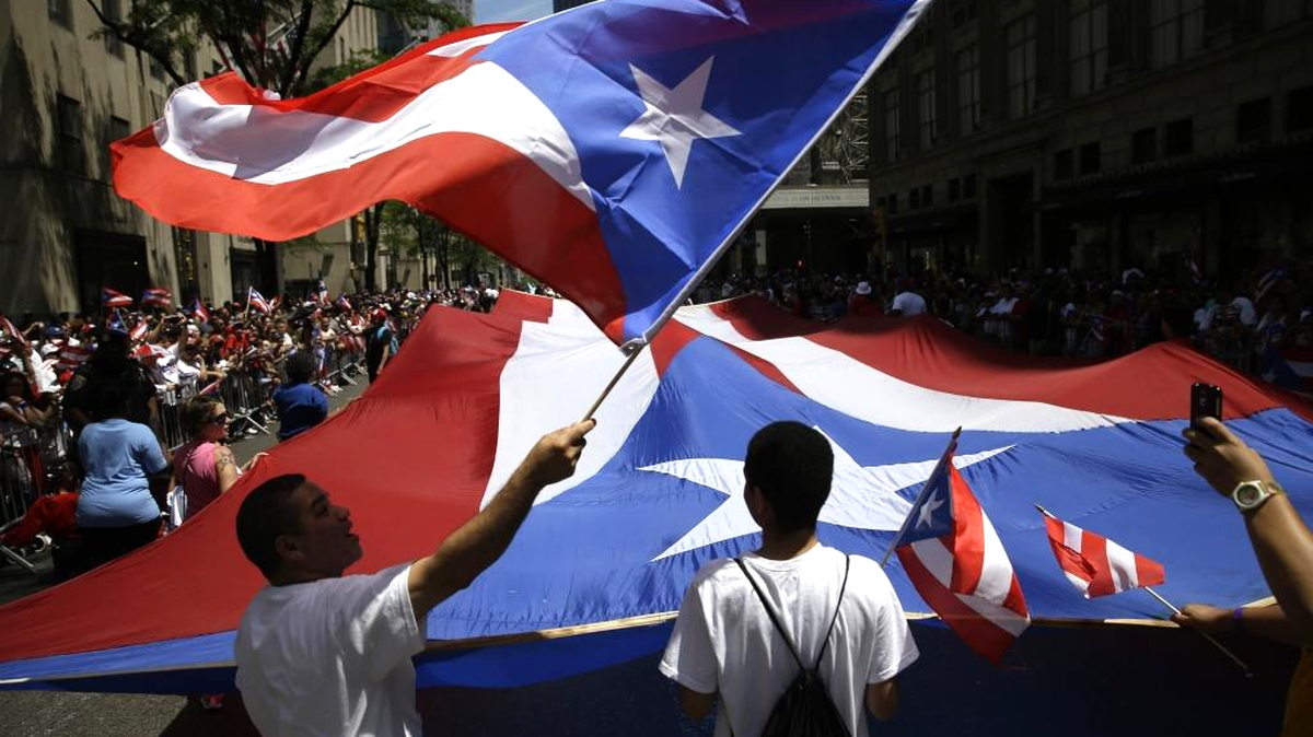 
Banderas de Puerto Rico en el desfile puertorriqueño en Nueva York en junio del 2014.

