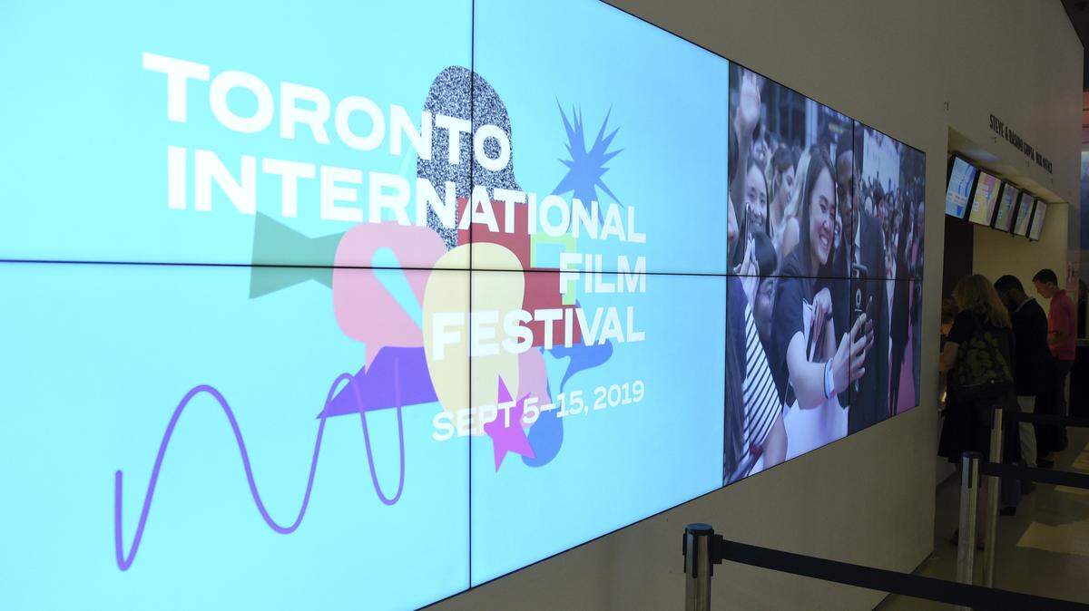 Event signage appears on day one of the Toronto International Film Festival at the TIFF Bell Lightbox on Thursday, Sept. 5, 2019, in Toronto. (Photo by Chris Pizzello/Invision/AP)