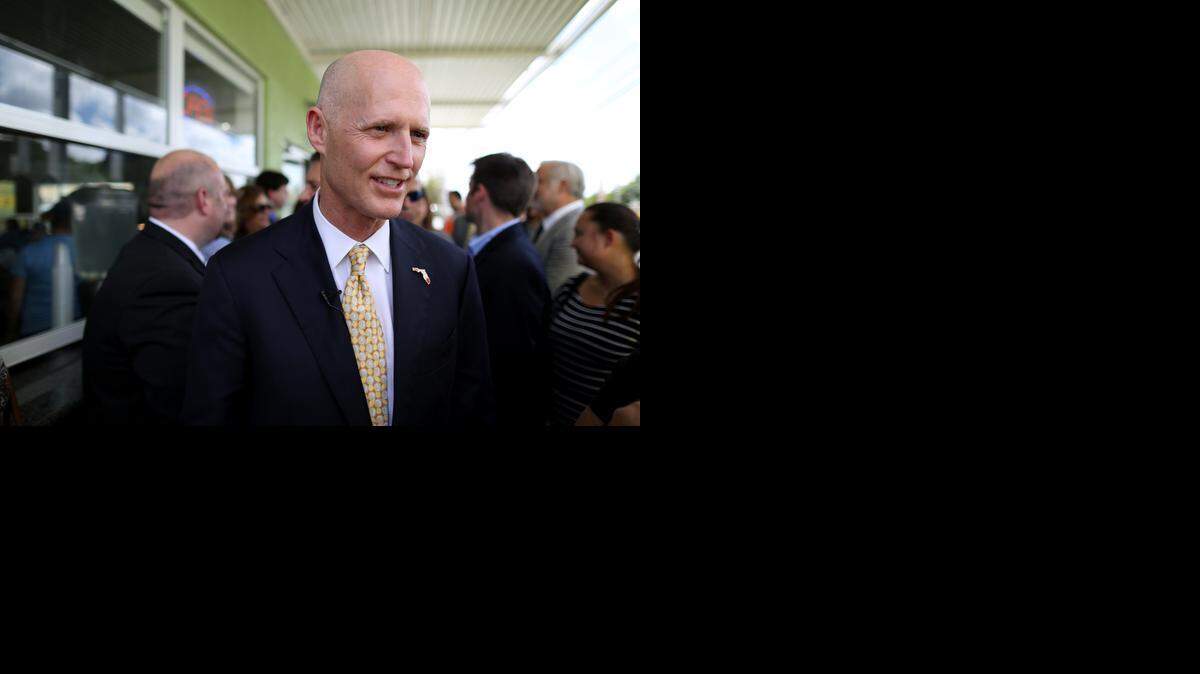 
El gobernador de la Florida, Rick Scott, habla con la prensa sobre el cambio climático, el pasado 9 de marzo en Hialeah.
