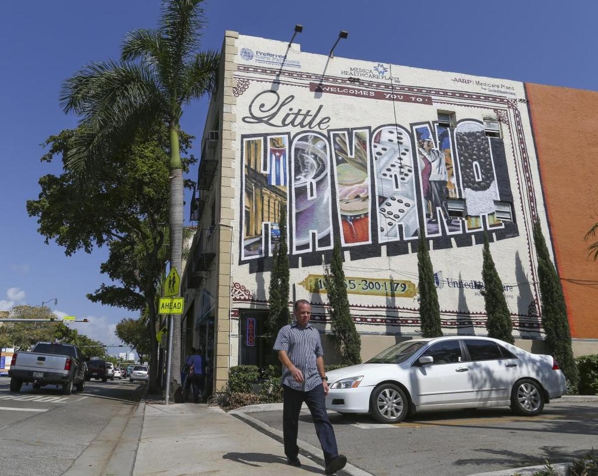 Little Havana has a median asking rent of $3,000 per month for the typical 1,135-square-foot rental in the area. It’s comparable to some of Miami-Dade County’s priciest rental markets. Above: A pedestrian passes by a Little Havana mural on Southwest Eighth Street, otherwise known as Calle Ocho.