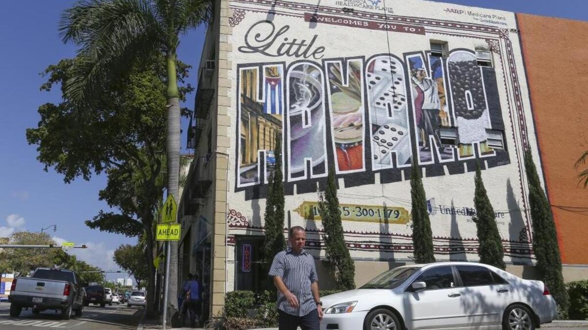 Little Havana has a median asking rent of $3,000 per month for the typical 1,135-square-foot rental in the area. It’s comparable to some of Miami-Dade County’s priciest rental markets. Above: A pedestrian passes by a Little Havana mural on Southwest Eighth Street, otherwise known as Calle Ocho. 