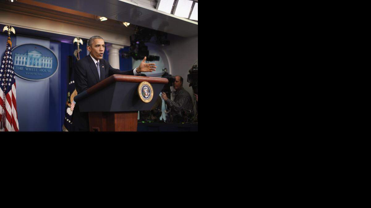 
El presidente Barack Obama habla con la prensa en la Casa Blanca sobre las relaciones con Cuba y otros temas, el 19 de diciembre.
