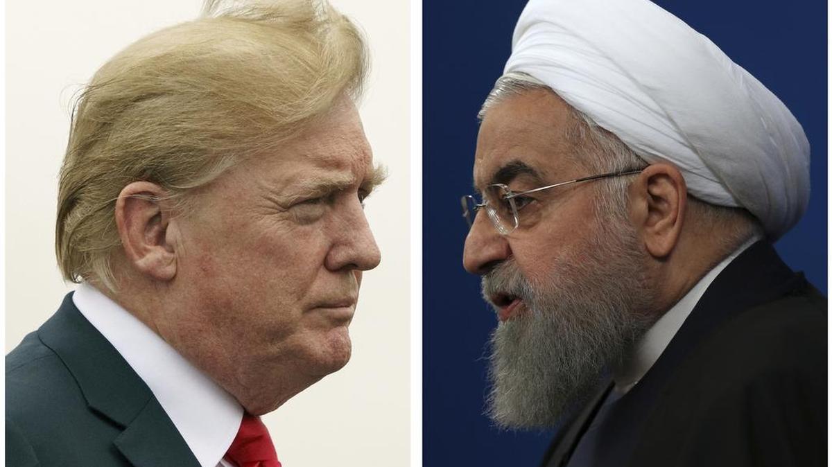 COMBO - This combination of two pictures shows U.S. President Donald Trump, left, on July 22, 2018, and Iranian President Hassan Rouhani on Feb. 6, 2018. In his latest salvo, Trump tweeted late on Sunday, July 22 that hostile threats from Iran could bring dire consequences. This was after Iranian President Rouhani remarked earlier in the day that “American must understand well that peace with Iran is the mother of all peace and war with Iran is the mother of all wars.” Trump tweeted: “NEVER EVER THREATEN THE UNITED STATES AGAIN OR YOU WILL SUFFER CONSEQUENCES THE LIKE OF WHICH FEW THROUGHOUT HISTORY HAVE EVER SUFFERED BEFORE.” (AP Photo)