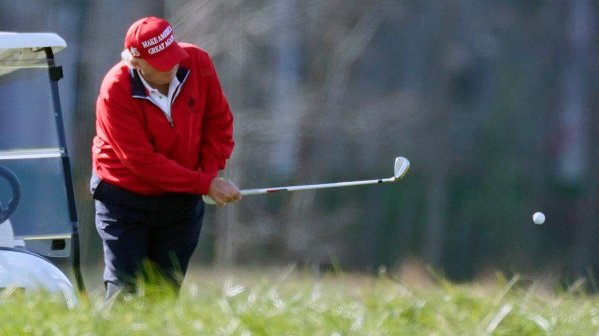 President Donald Trump plays golf at Trump National Golf Club, Saturday, Nov. 28, 2020, in Sterling, Va. (AP Photo/Alex Brandon)