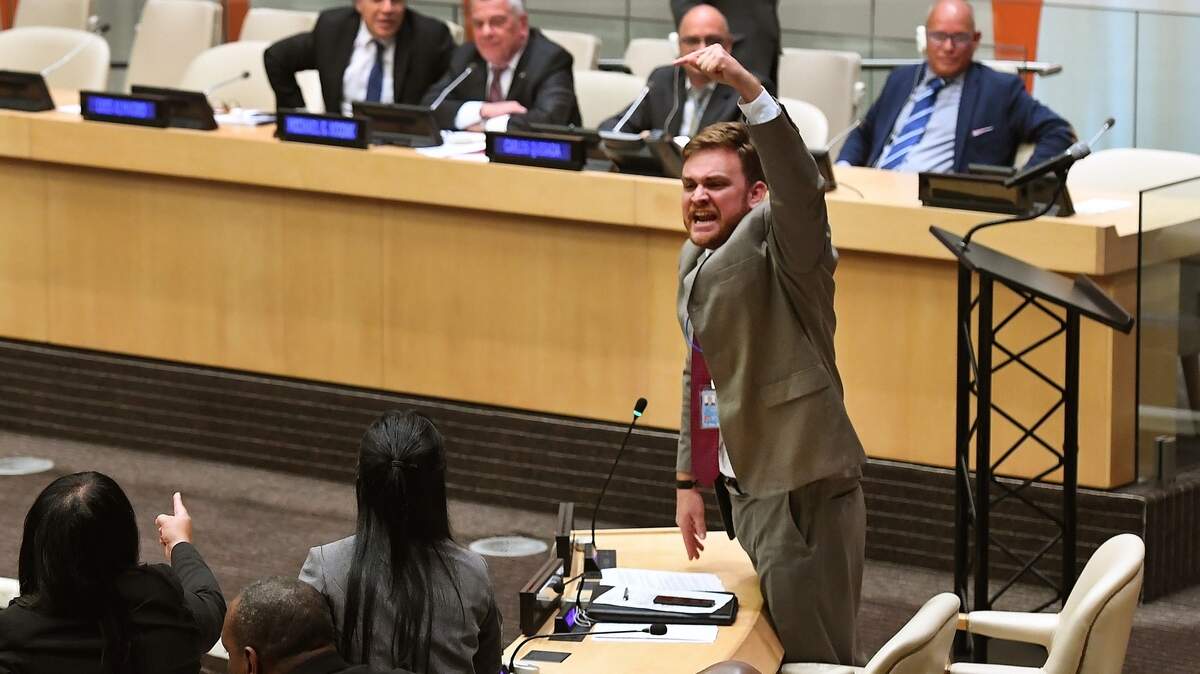 A member of the Cuban diplomatic delegation interrupts a United Nations session on October 16 when the United States tried to introduce a new campaign to highlight the cases of Cuban political prisoners.
