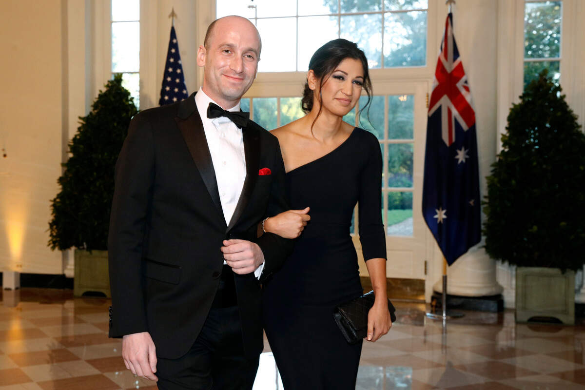 FILE - In this Sept. 20, 2019, file photo President Donald Trump’s White House Senior Adviser Stephen Miller, left, and Katie Waldman, now Miller, arrive for a State Dinner with Australian Prime Minister Scott Morrison and President Donald Trump at the White House in Washington. Vice President Mike Pence’s press secretary has the coronavirus, the White House said Friday, making her the second person who works at the White House complex known to test positive for the virus this week.&nbsp;Pence spokeswoman Katie Miller, who tested positive Friday, May 8, 2020, had been in recent contact with Pence but not with the president. (AP Photo/Patrick Semansky, File)