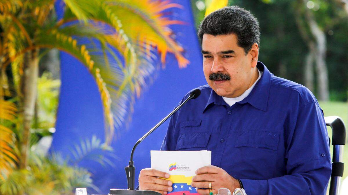 Handout picture released by the Venezuelan Presidency showing Venezuela’s President Nicolas Maduro giving a televised message from Miraflores Presidential Palace in Caracas on March 21, 2021. (Photo by JHONN ZERPA / Venezuelan Presidency / AFP) / RESTRICTED TO EDITORIAL USE - MANDATORY CREDIT “AFP PHOTO / VENEZUELA’S PRESIDENCY / JHONN ZERPA” - NO MARKETING - NO ADVERTISING CAMPAIGNS - DISTRIBUTED AS A SERVICE TO CLIENTS (Photo by JHONN ZERPA/Venezuelan Presidency/AFP via Getty Images)