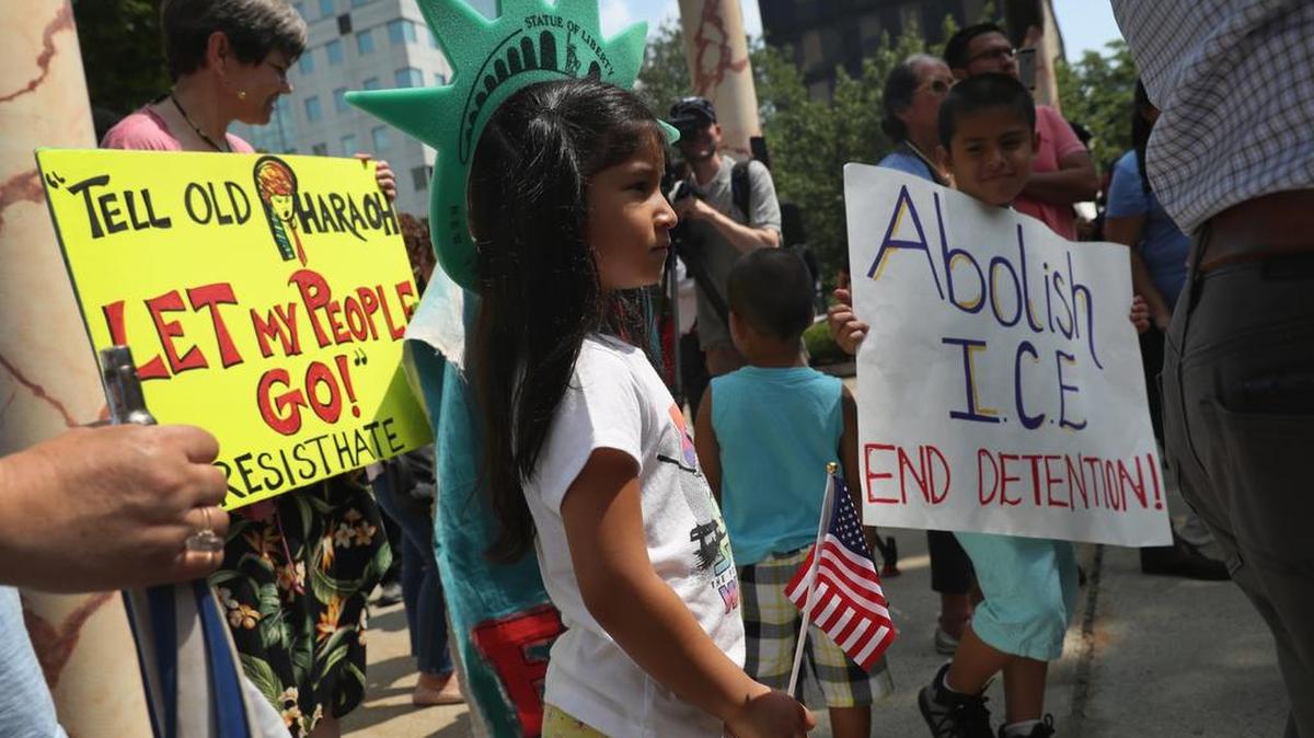 BRIDGEPORT, CT - JULY 11:  Protesters rally against the separation of immigrant families in front of a U.S. federal court on July 11, 2018 in Bridgeport, Connecticut. The rally was in support of two Central American children separated from their parents as a result of the Trump administration’s “zero tolerance” policy on undocumented immigration at the southern border. The two children, who are reportedly being held in a facility in Groton, CT were to appear at a court hearing ahead of possible reunification with their parents.  (Photo by John Moore/Getty Images)