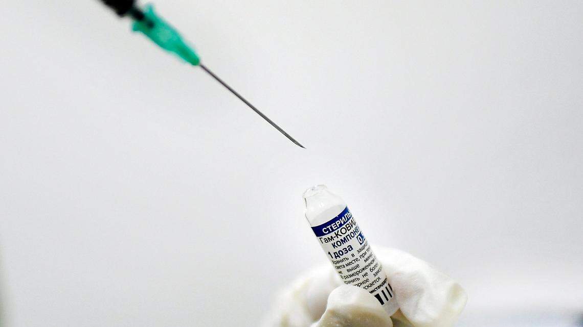 No, getting a COVID vaccine won’t threaten your life insurance. Here’s what to know