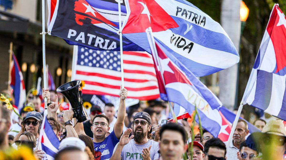 Protesters march down 8th Street to commemorate the first anniversary of the July 11 mass protests in Cuba, on Tuesday July 1, 2022 in Miami, Fl..
