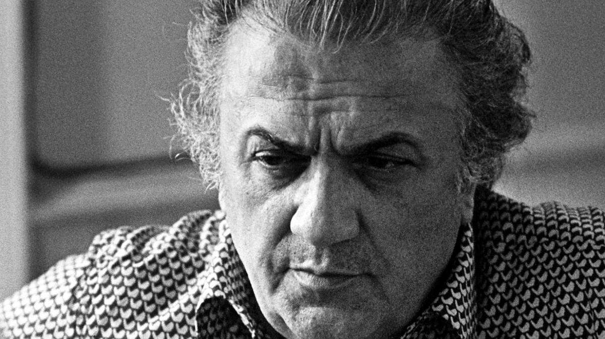 (FILES) A picture taken 08 February 1980 in Rome of Italian film director Federico Fellini. A museum devoted to the great Italian filmmaker Federico Fellini who died 10 years ago (31 October 1993) is to be opened next month in the house in the Adriatic resort of Rimini where he was born. Handwritten sketches, snatches of footage hitherto unseen, forgotten interviews, books with the director’s peronal annotations, even the black cap worn by the magician in “La Dolce Vita,” will feature among the many exhibits, said Vittorio Boarini, director of the museum foundation. Fellini’s sister Maddalena and her husband still live in the house in Rimini where the director of the classics “La Strada” and “I Vitelloni” was born in 1920. AFP PHOTO