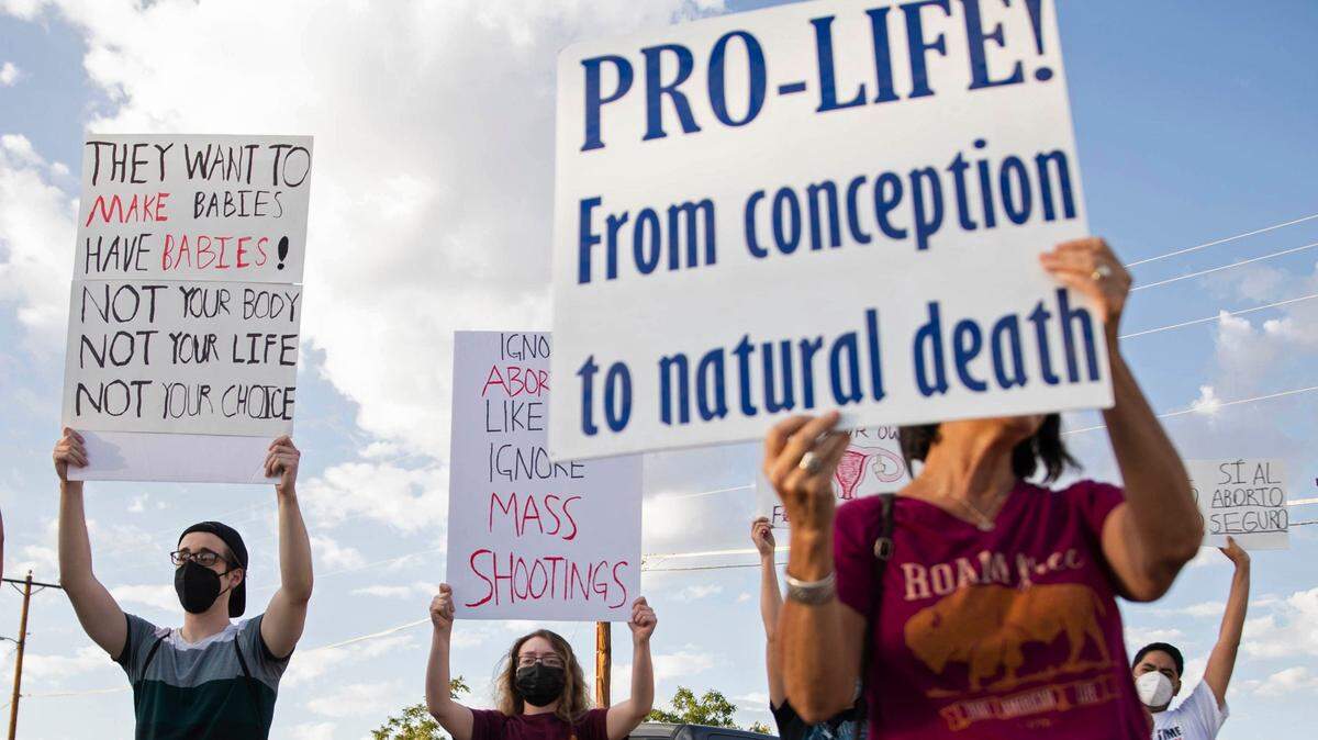 FIghts over repeal of Roe v. Wade have led to protests around the country, including this one in Las Cruces, New Mexico in July.