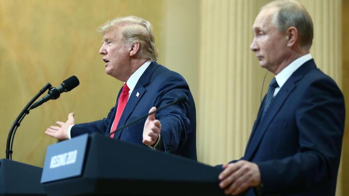 US President Donald Trump (L) and Russia’s President Vladimir Putin give a joint news conference following their meeting at the Presidential Palace. Helsinki, Finland, July 16, 2018.  (Valery Sharifulin/Tass/Abaca Press/TNS)
