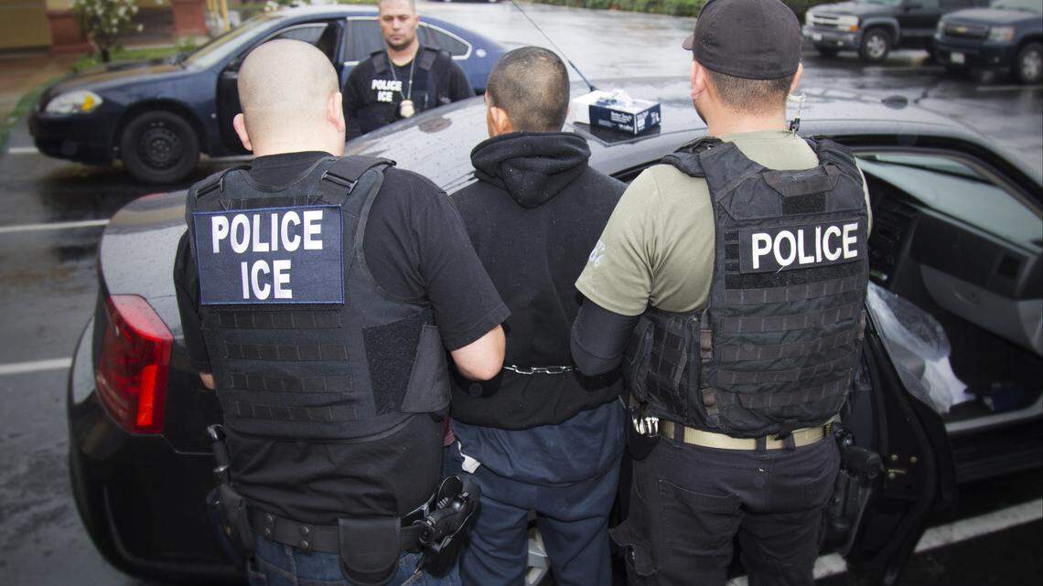 In this photo taken Feb. 7, 2017, released by U.S. Immigration and Customs Enforcement, an arrest is made during a targeted enforcement operation conducted by U.S. Immigration and Customs Enforcement (ICE) aimed at immigration fugitives, re-entrants and at-large criminal aliens in Los Angeles. The Trump administration is wholesale rewriting the U.S. immigration enforcement priorities, broadly expanding the number of immigrants living in the U.S. illegally who are priorities for deportation, according to a pair of enforcement memos released Tuesday, Feb. 21, 2017. (Charles Reed/U.S. Immigration and Customs Enforcement via AP)