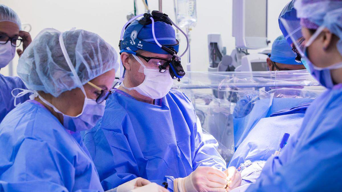 Dr. Joseph Lamelas, chief and program director of cardiac surgery at University of Miami Health System, operates on a patient, pioneering a valve procedure he coined “The Miami Method.”