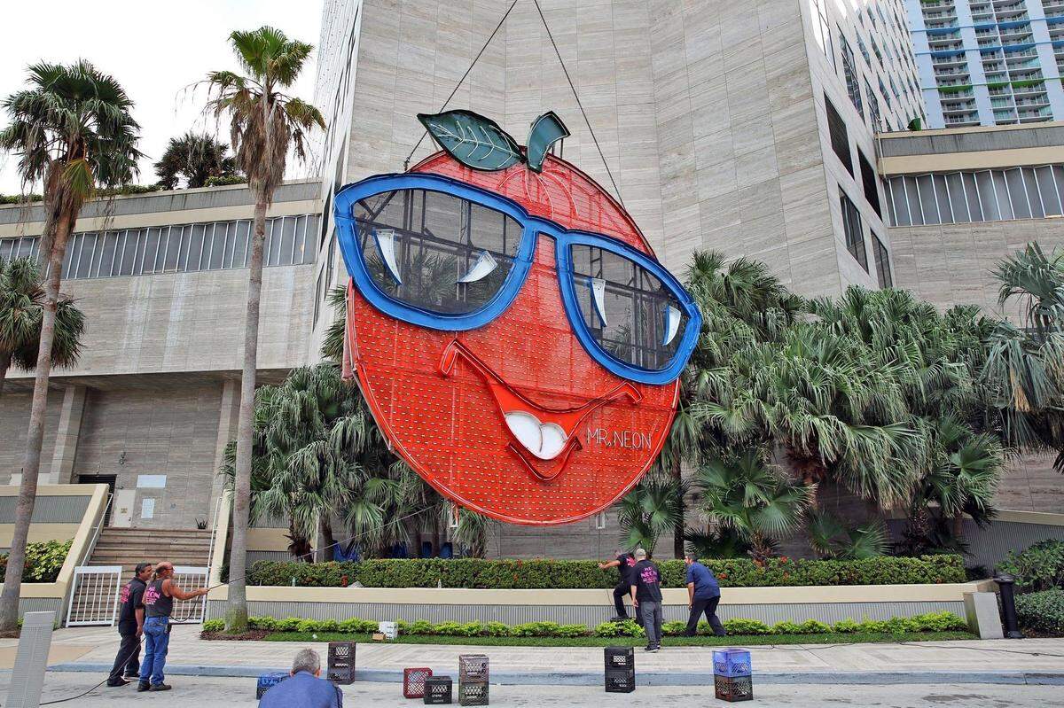 The Big Orange is a Miami tradition; the giant neon sign rises to the top of the  InterContinental Miami Hotel at New Year’s.