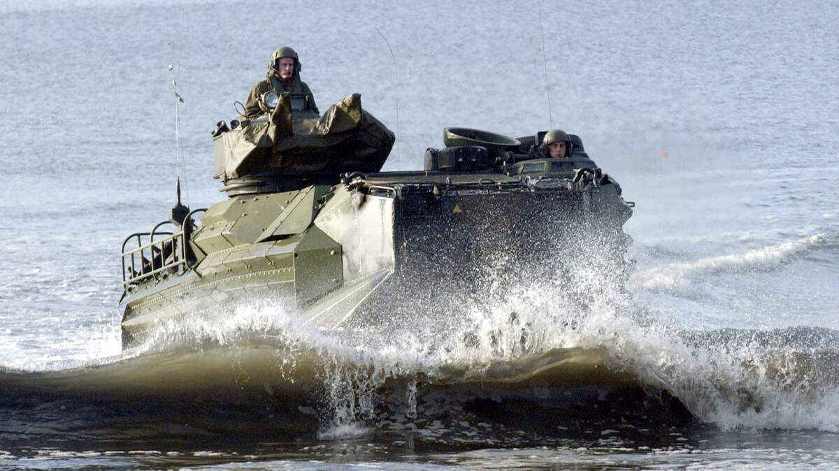 An amphibious assault vehicle nears shore on Santa Rosa Sound, Friday, Dec. 12, 2003, during a Marine Corps exercie at Eglin Air Force Base, Fla. It is the first such exercise at Elgin, which the Marines are considering as a replacement for Vieques Island in Puerto Rico. The Navy closed a training site there after a series of protests after errant bombs killed a civilian security guard in 1999. (AP Photo/Pensacola News Journal, Katie King)