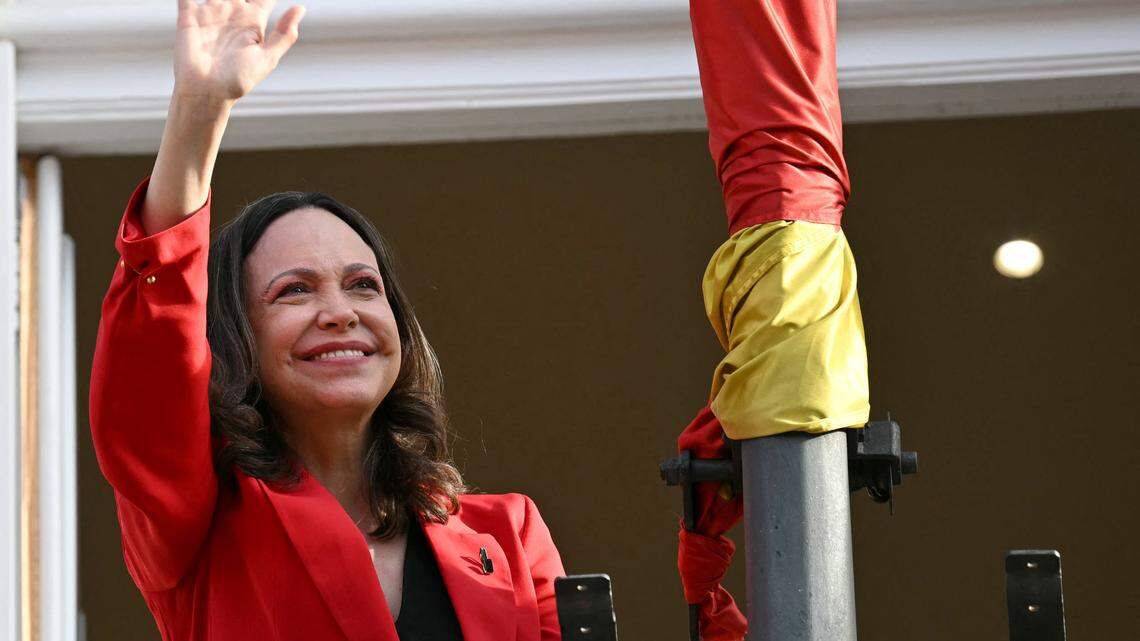 Venezuelan opposition leader Maria Corina Machado waves to supporters in Madrid's Puerta del Sol on April 18, 2026. Spain's right-wing parties showed their support for Venezuelan opposition figure and Nobel Peace Prize winner Maria Corina Machado who  turned down a meeting with the country's leftist PM, considering it 'unsuitable' for the moment. (Photo by Javier SORIANO / AFP via Getty Images)