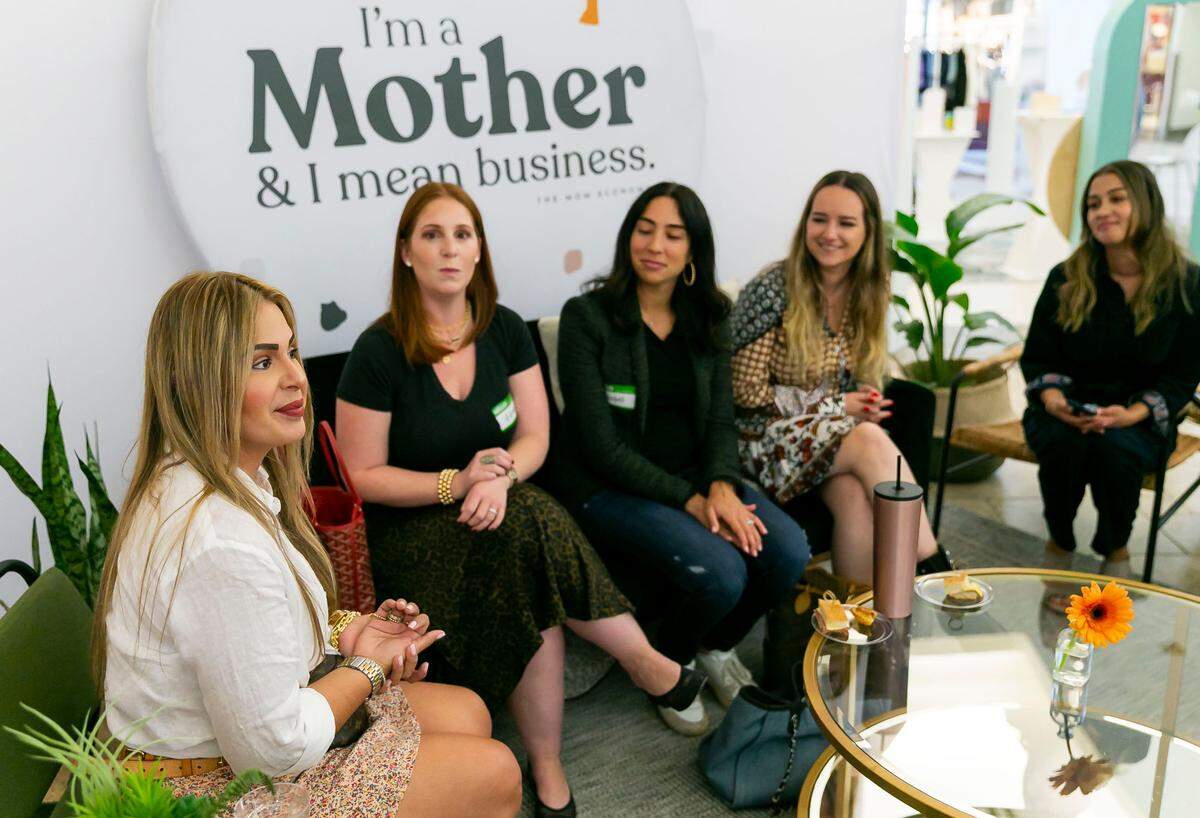 Lina Broche, far-left, a mom of two children and the owner of Pretty Girl Charm, attends SHOP MOM hosted by The Mom Economy and Shopify inside Dadeland Mall in Miami’s Kendall neighborhood on Friday, November 5, 2021.