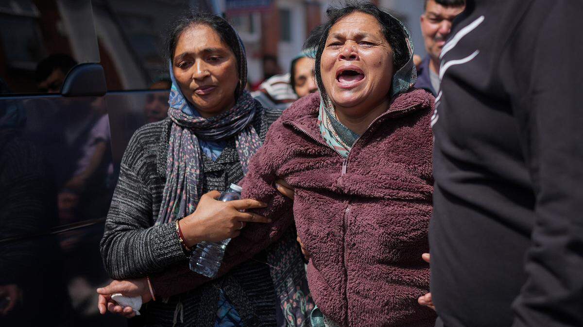 LEICESTER, UNITED KINGDOM - JUNE 13: The mother of both Vishwash Kumar Ramesh, the sole British survivor of the Air India Ahmedabad Airport crash and his brother Ajay Ramesh, who is believed to not have survived, boards a mini bus to travel to India on June 13, 2025 in Leicester, United Kingdom. At least 53 of the passengers Air India Flight 171, which crashed shortly after takeoff on its way from Ahmedabad to London Gatwick, were British nationals. The sole survivor is a British man, Vishwashkumar Ramesh. A total of 241 passengers and crew were reported to have died, plus others who were in a building hit by the plane. (Photo by Christopher Furlong/Getty Images)