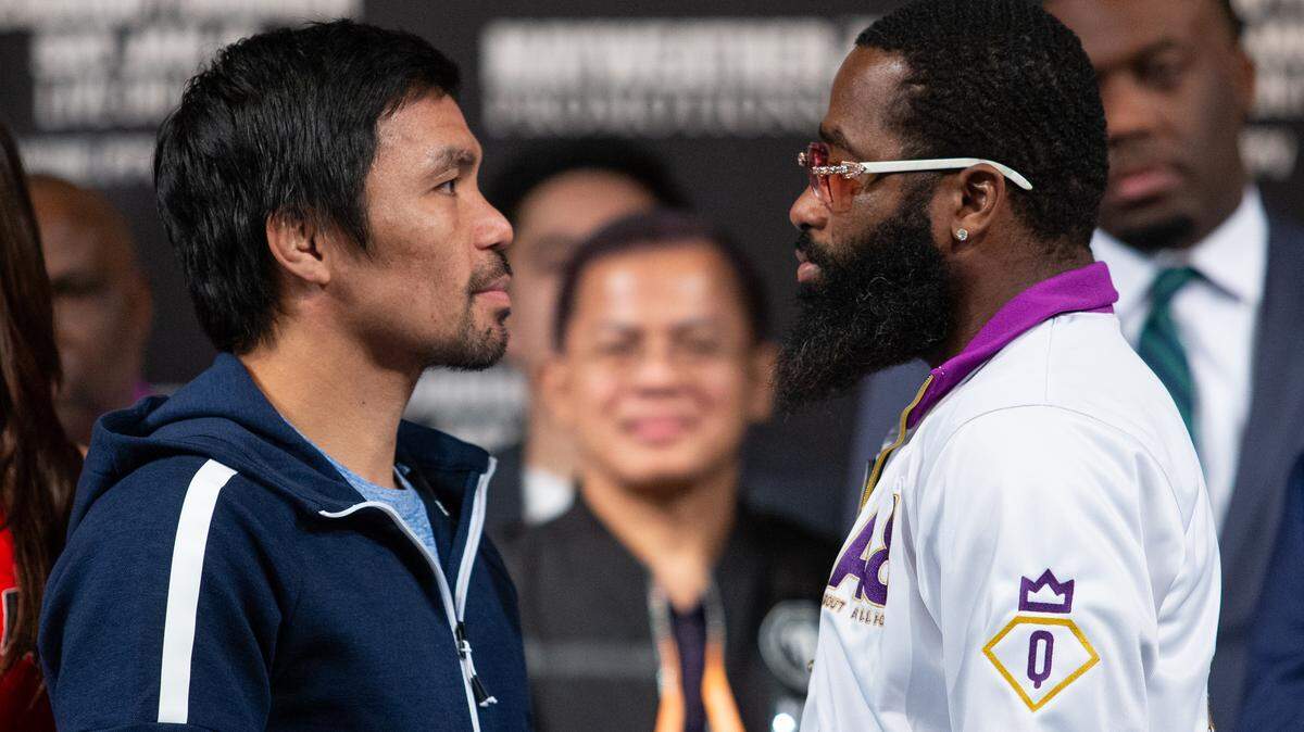 MANNY PACQUIAO y Adrien Broner (d) durante el cara a cara de la conferencia de prensa del jueves en Las Vegas.