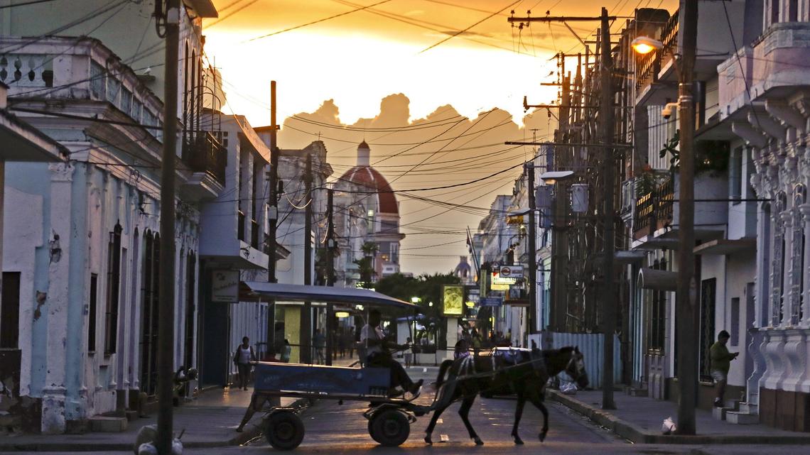 A horse-drawn carriage at sunset on the streets of Cienfuegos, Cuba, on Thursday, September 8, 2016.