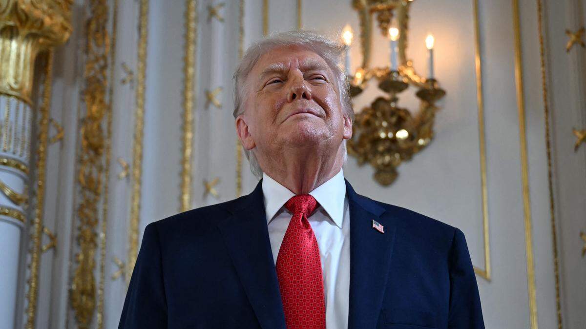 US President Donald Trump arrives to take part in a dedication ceremony for Southern Boulevard, in the ballroom at Mar-a-Lago in Palm Beach, Florida, on January 16, 2026. Palm Beach Southern Boulevard between Kirk Road and South Ocean Boulevard is being renamed as "President Donald J. Trump Boulevard." (Photo by ANDREW CABALLERO-REYNOLDS / AFP via Getty Images)