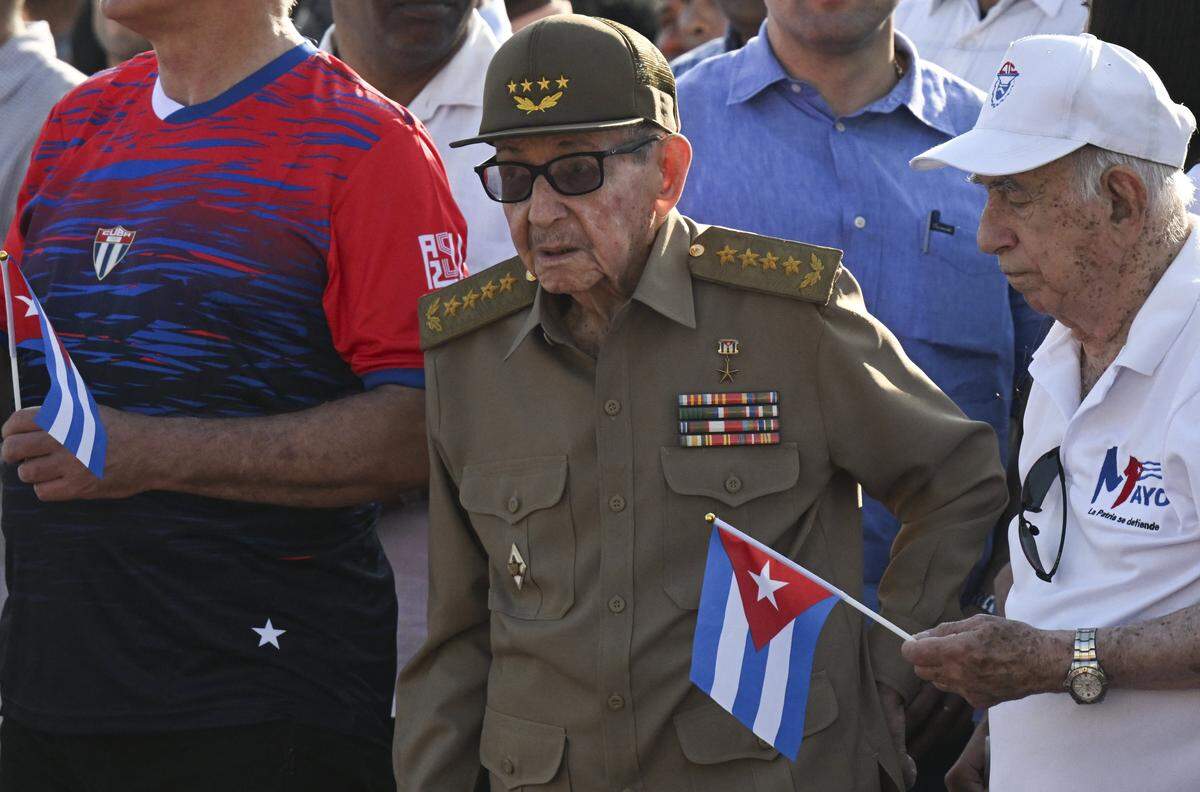 Cuba's former President Raul Castro (C) and former Vice-President Jose Ramon Machado Ventura (R) attend a May Day rally marking International Workers' Day in Havana on May 1, 2026. (Photo by YAMIL LAGE / AFP via Getty Images)