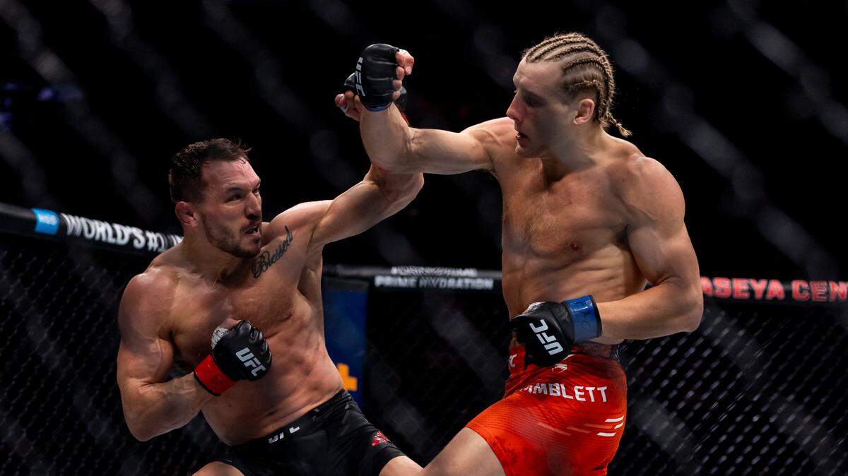 Paddy Pimblett (der.) se impuso con autoridad y estrategia a un veterano curtido como Michael Chandler en el evento coestelar de la cartelera UFC 314 en Miami.
