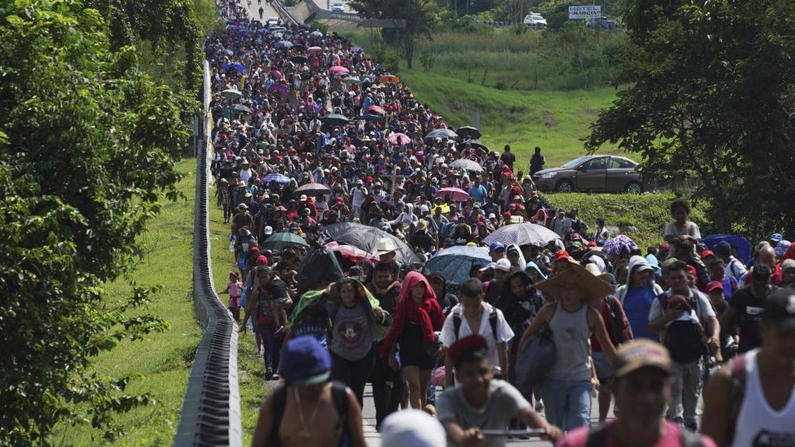 Migrants arrive in Villa Comaltitlan, Chiapas state, Mexico, on Oct. 27, 2021, as they continue their journey through Mexico to the U.S. border.