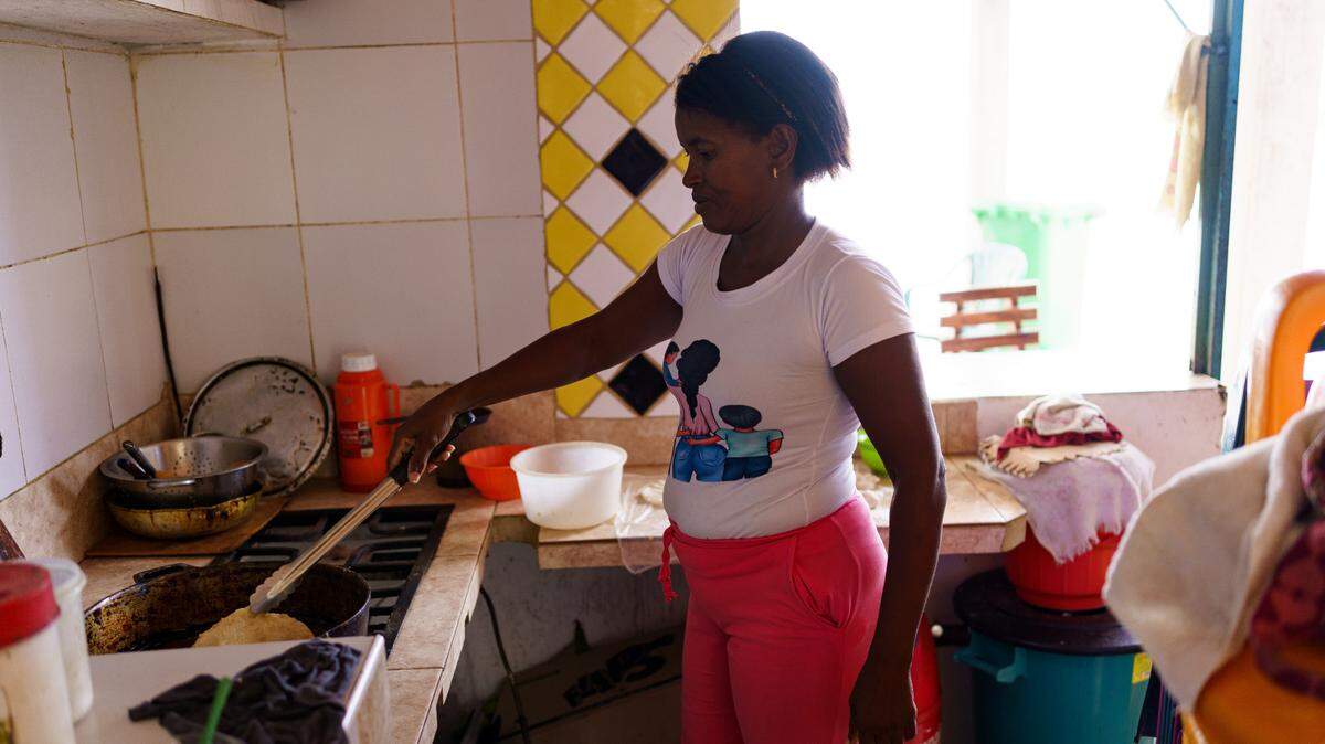 A woman prepares empanadas to sell at her home in Caracas, Venezuela, in this Dec. 8, 2023 file photo.