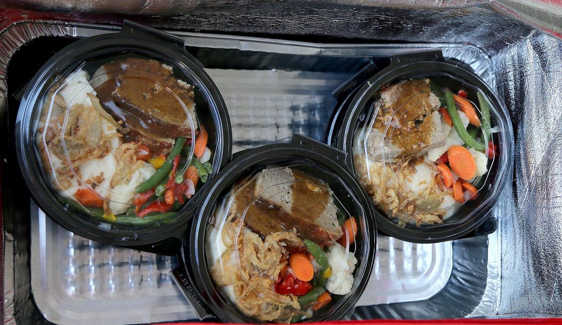 A sample of meals by Mena Catering company ready for delivery to clients at their headquarters in Miami on Wednesday, May 06, 2020. They are adjusting to a new business model due to the coronavirus pandemic.