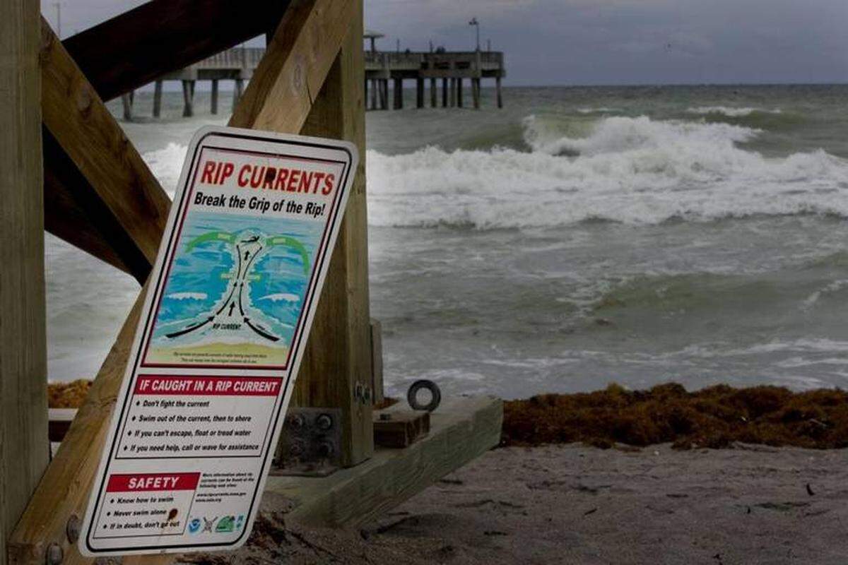 A beach sign warns of rip currents in this file photo. A high risk for dangerous rip currents was in effect May 3, 2022 and remains through May 5, in Palm Beach, Miami-Dade and Broward County beaches, according to the National Weather Service in Miami.