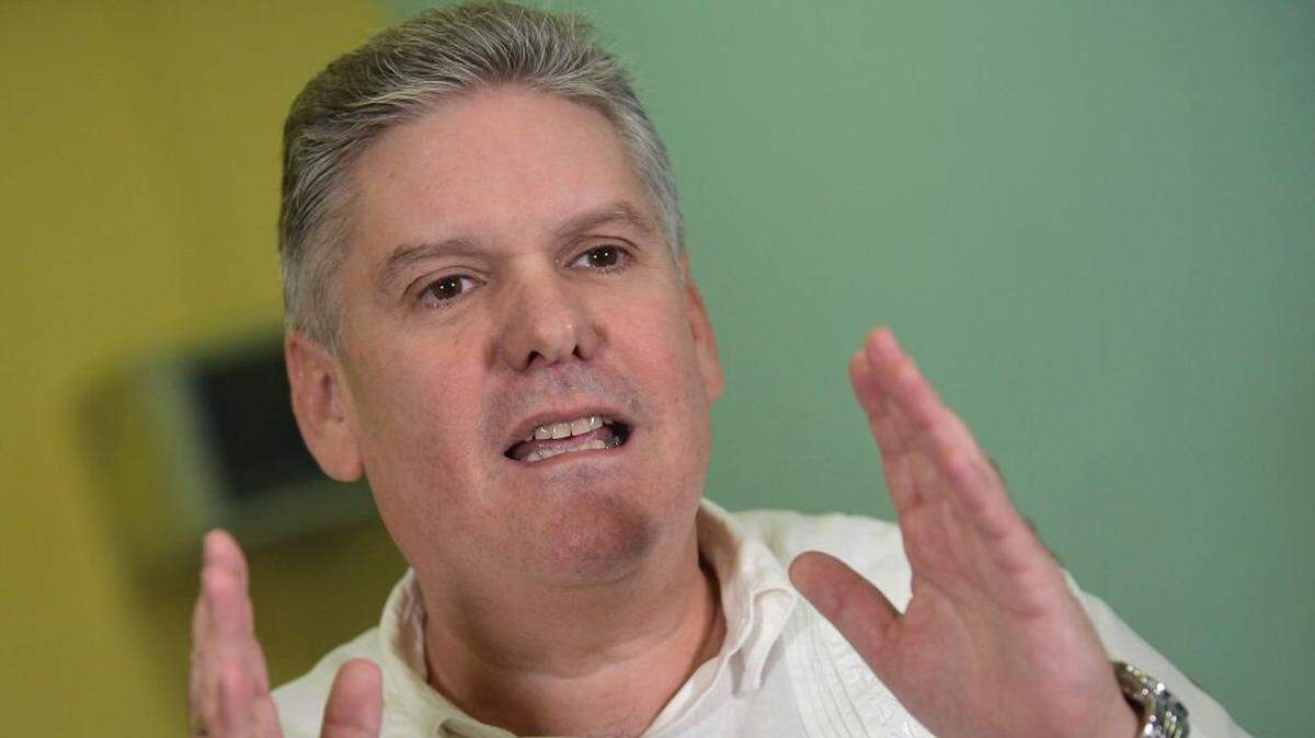 Cuban Economy Minister Alejandro Gil talks during an interview with AFP at the Economy Ministry in Havana, on December 17, 2019. - With no date yet set, Cuba is preparing to reform its currency system and unify its two circulating currencies, the CUP, or Cuban peso, and the CUC, or convertible peso, which have been in use in the local market since 1994. (Photo by Yamil LAGE / AFP) (Photo by YAMIL LAGE/AFP via Getty Images)