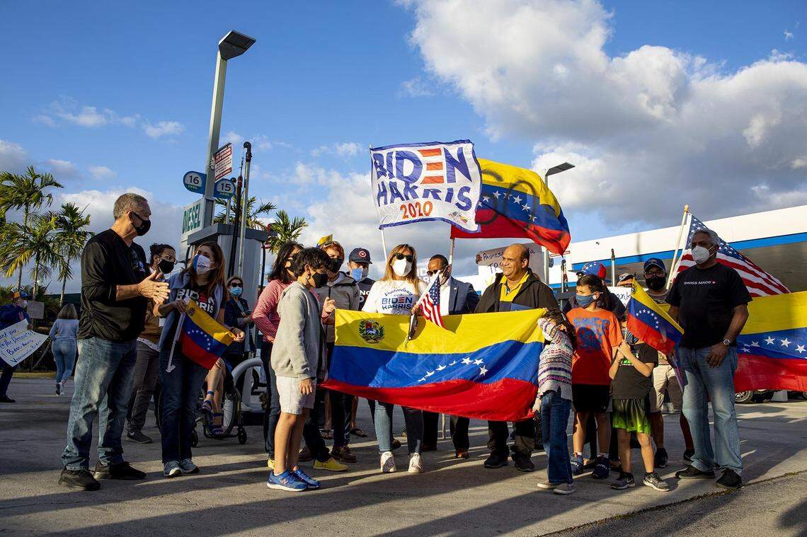 Biden supporter Adelys Ferro speaks to the media in March 2021 as Venezulan-Americans celebrate the approval of temporary protection status for more than 300,000 Venezuelan citizens living in the United States, at El Arepazo in Doral.