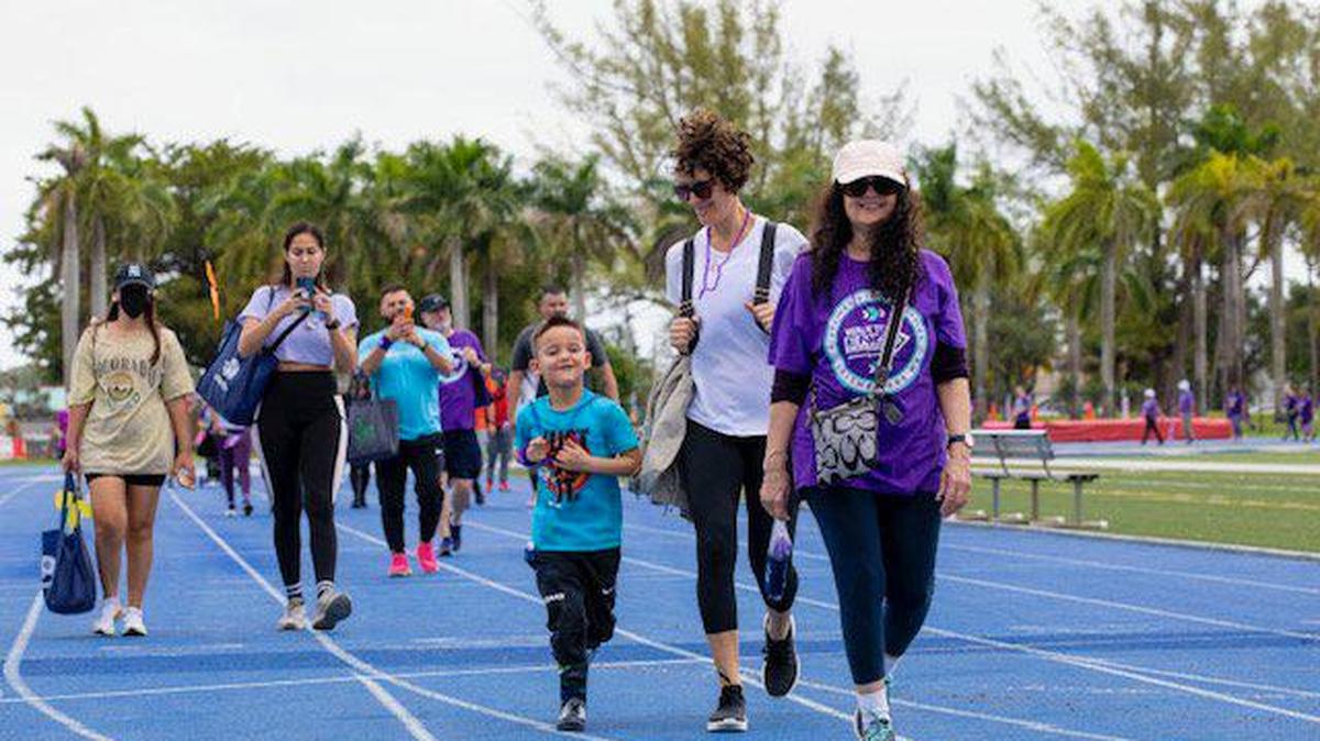 Miami-Dade County residents walk to end Alzheimer’s disease in Miami in 2021.