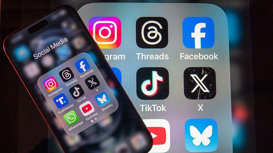 Social media apps depicted on a cell phone. 